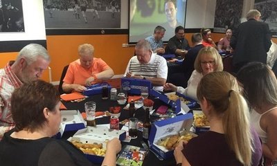 People enjoying fish and chips last time out