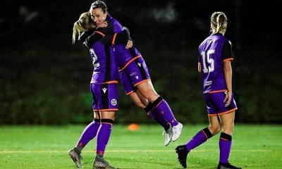 Robyn Smith celebrates with Holly Napier after she scored the last goal in the 4-1 home win over Boroughmuir Thistle.
